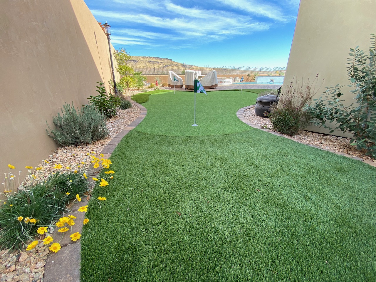 St. George Landscaper True Roots Landscaping and Design creates artificial turf landscapes, paver patios, and other hardscape designs throughout southern Utah.Artificial Turf Putting Green