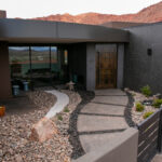 For Rich and Bonnie's landscape in Kayenta the goal was to create a zen-like atmosphere in their front courtyard and to incorporate the landscape surrounding the home into the features of their backyard.